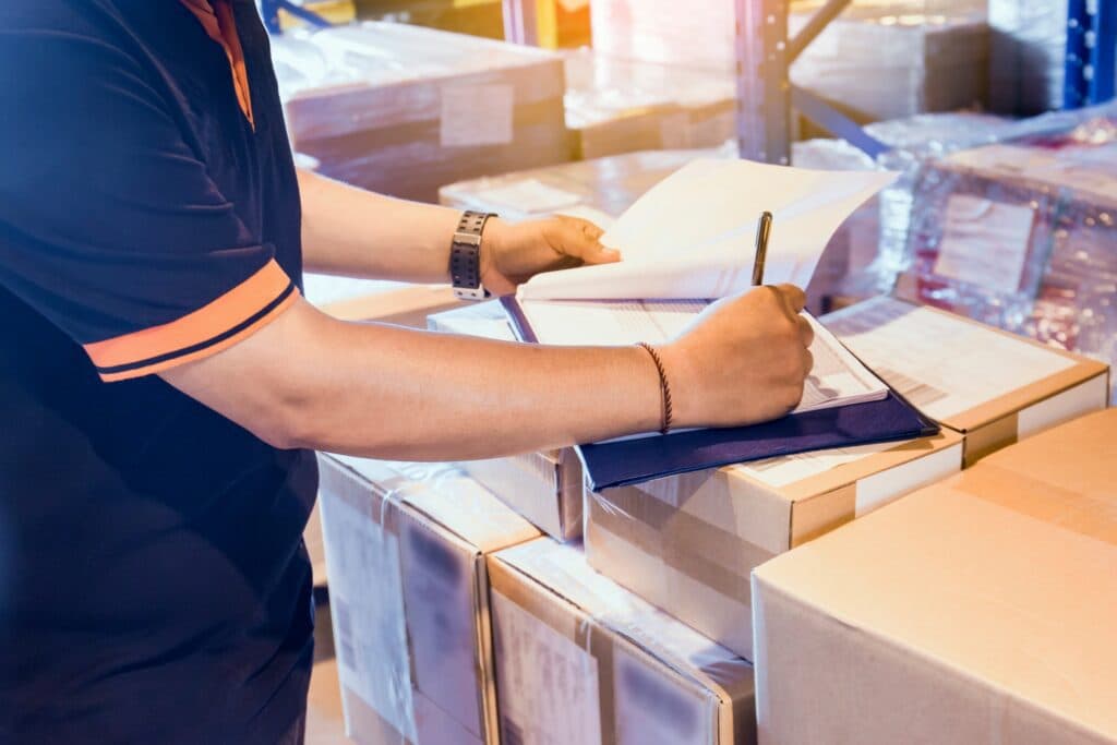 Customs inspector reviewing cargo